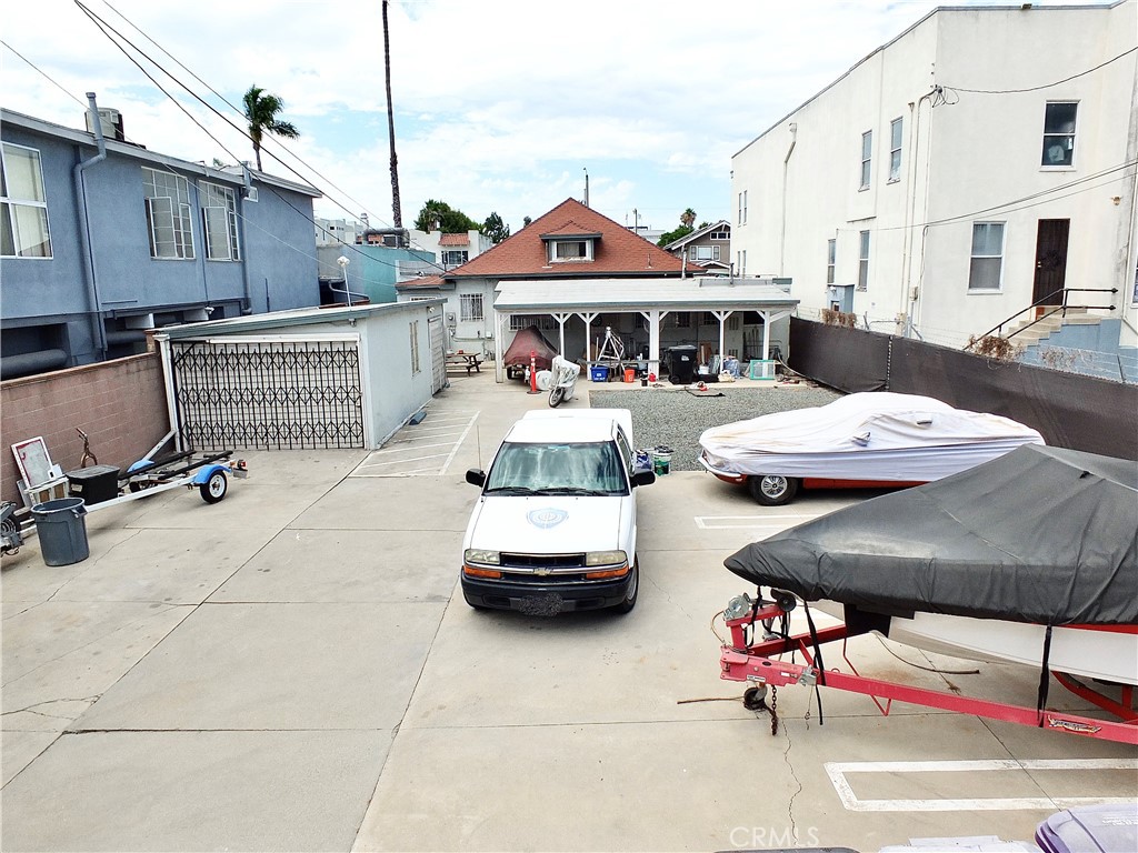 836 Atlantic Avenue Long Beach, CA 90813 - Photo 3 of 27 a front view of a building with table and chairs