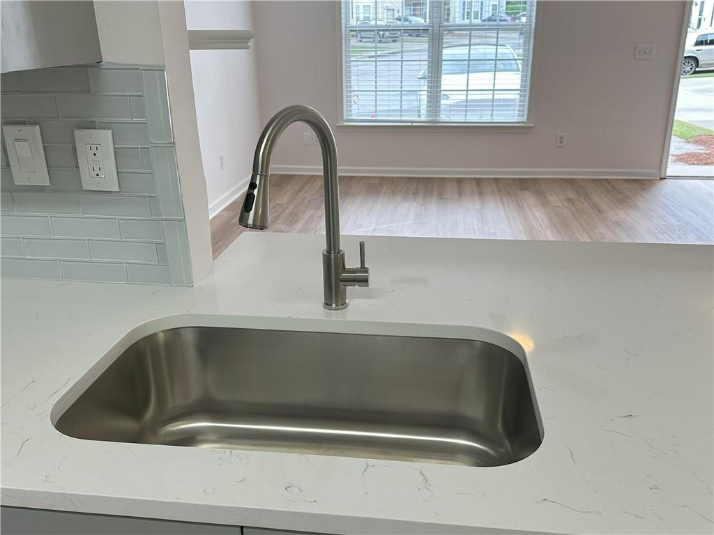 4162 Howell Park Road Duluth, GA 30096 - Photo 7 of 16 a close view of sink and tap