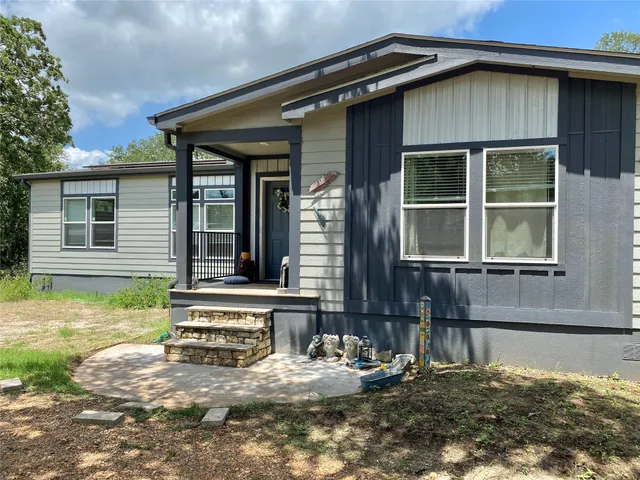 a house view with a outdoor space