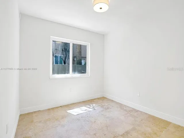 a view of empty room with window