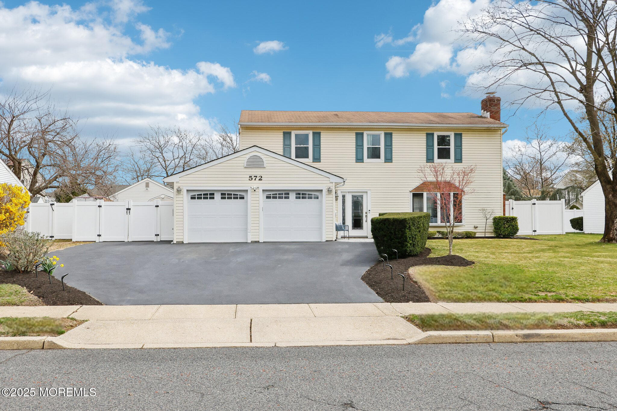 572 Line Road Hazlet, NJ 07730 - Photo 1 of 39 a view of a white house with a yard