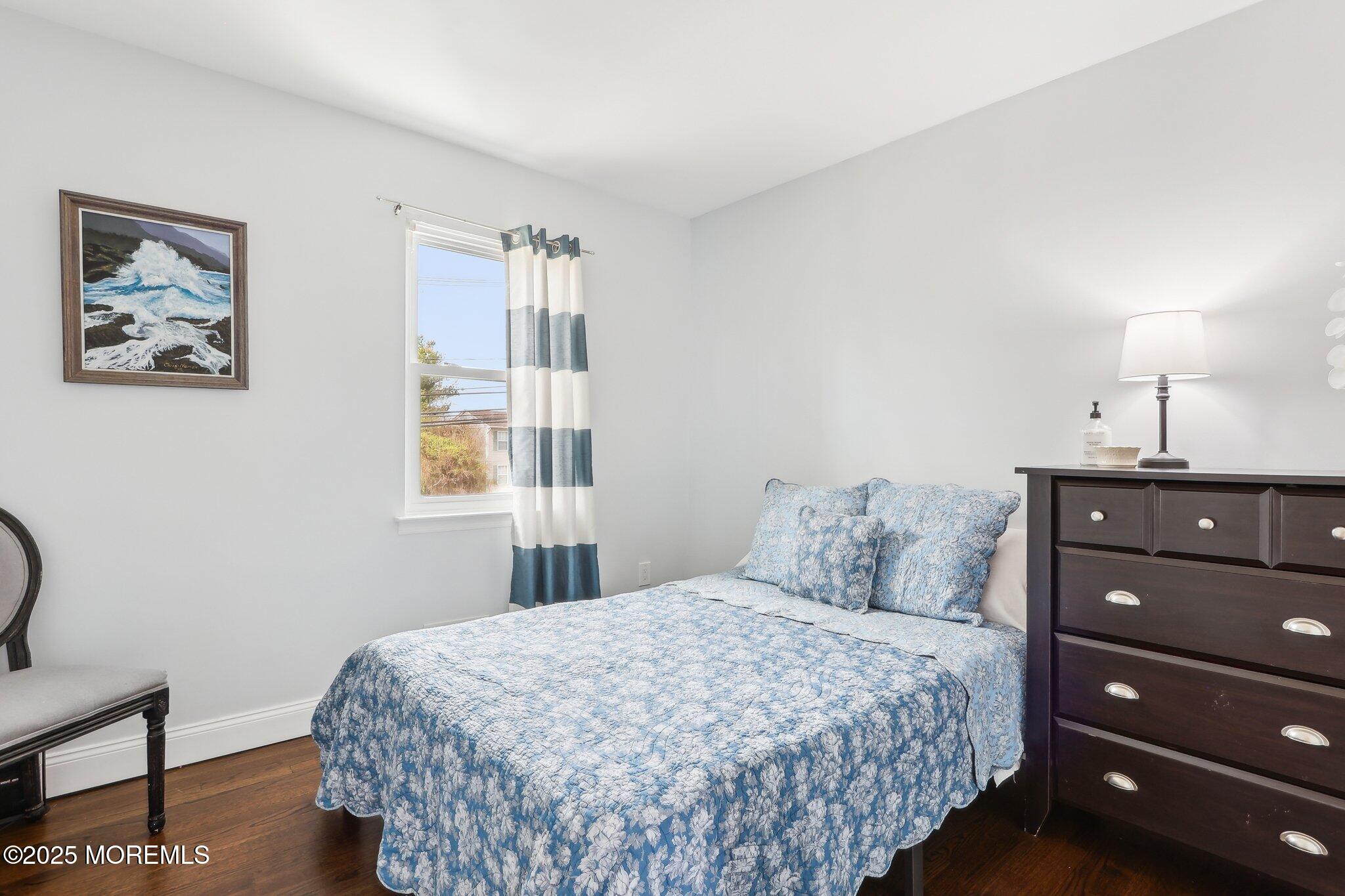 572 Line Road Hazlet, NJ 07730 - Photo 26 of 39 a bedroom with a bed and a window