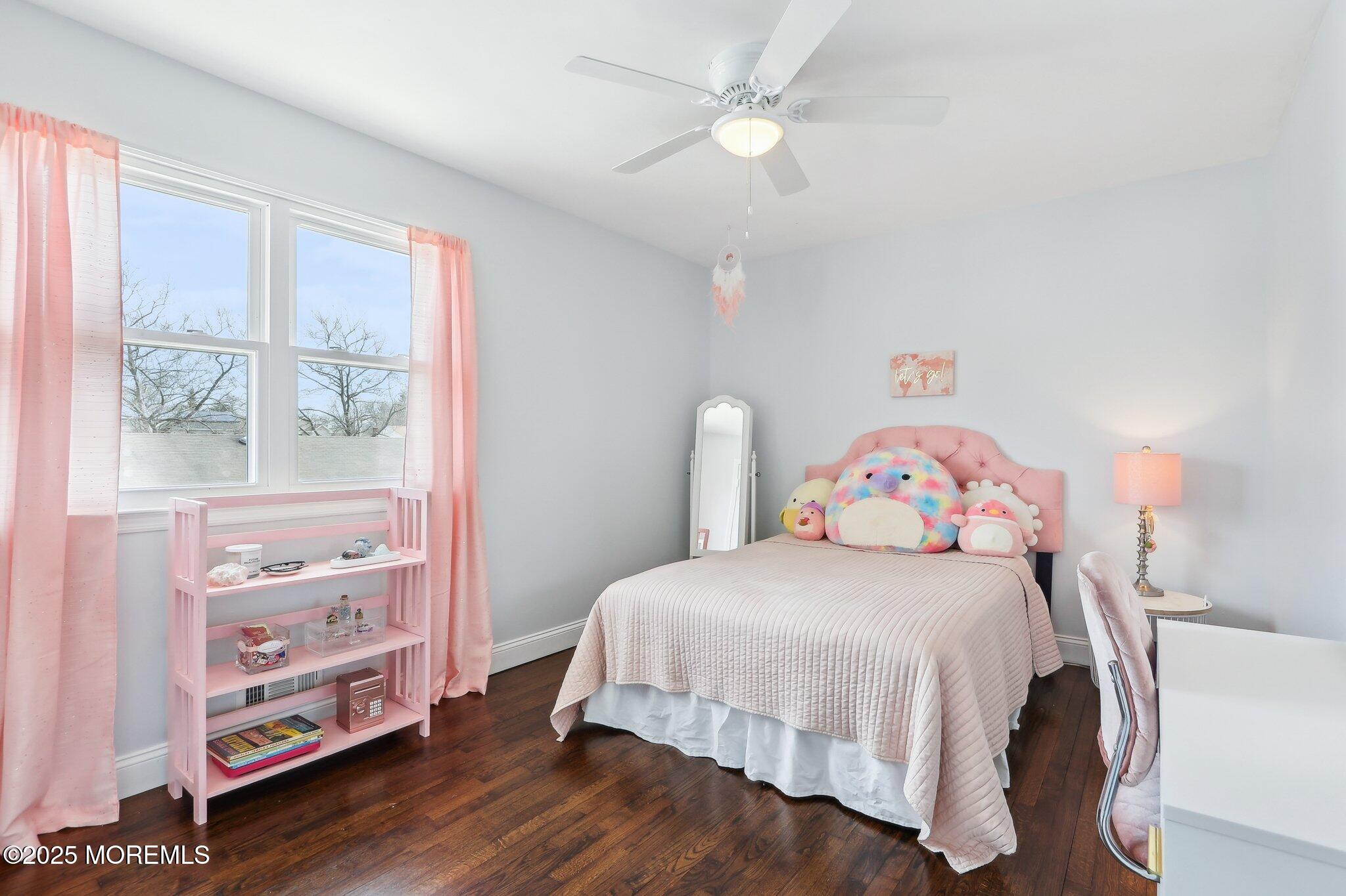 572 Line Road Hazlet, NJ 07730 - Photo 28 of 39 a bedroom with a bed and a window
