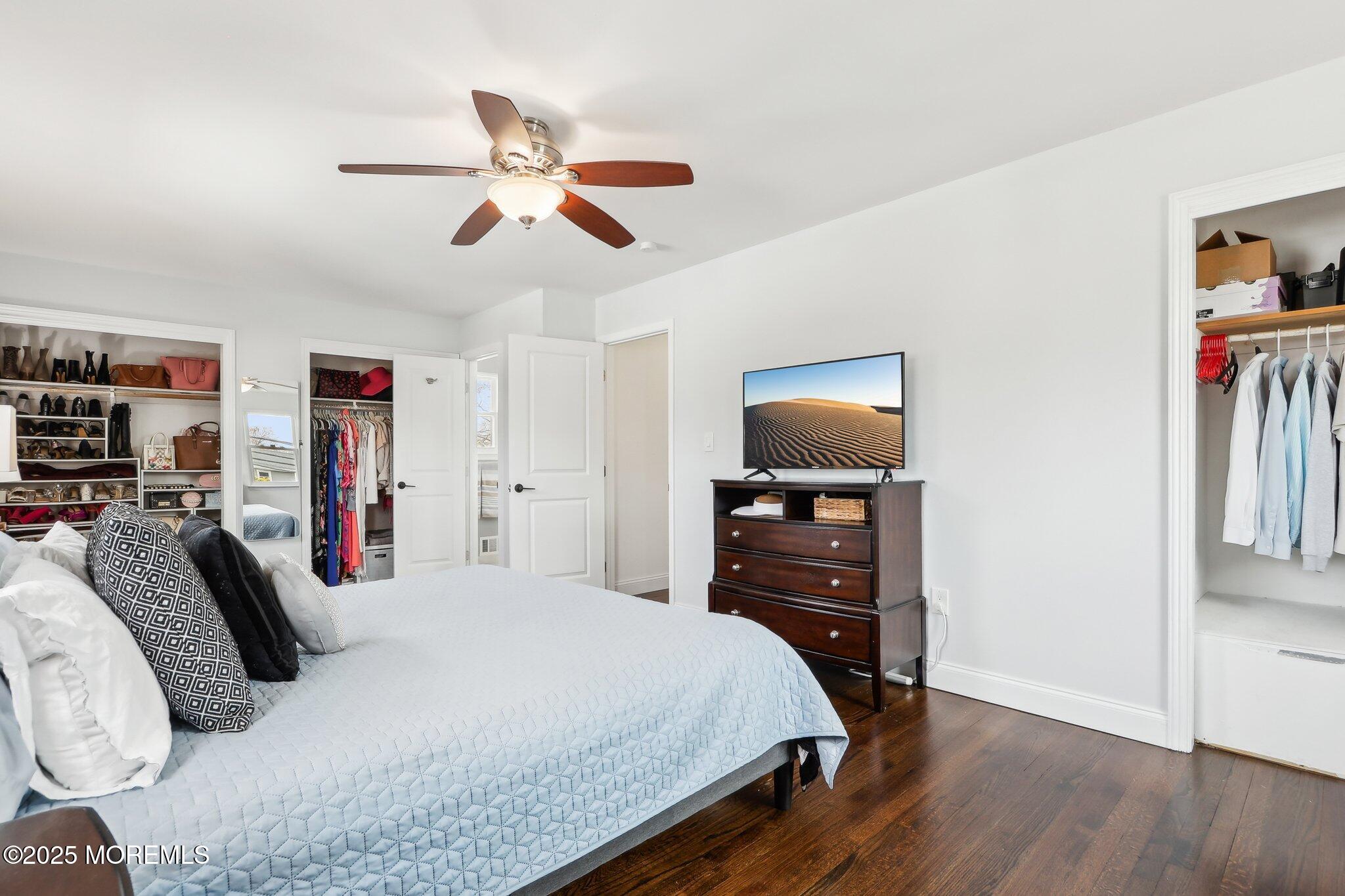 572 Line Road Hazlet, NJ 07730 - Photo 32 of 39 a bedroom with a bed and a flat screen tv