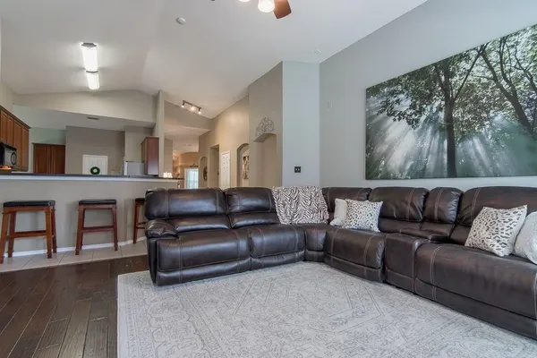 a view of a livingroom with furniture and a couch