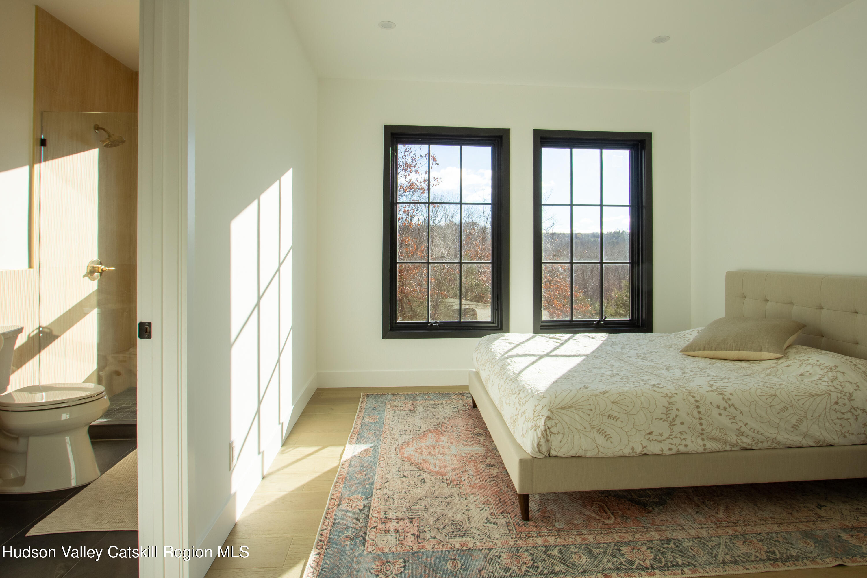 490 Old Rte 82 Elizaville, NY 12523 - Photo 14 of 26 a bedroom with a bed and a window
