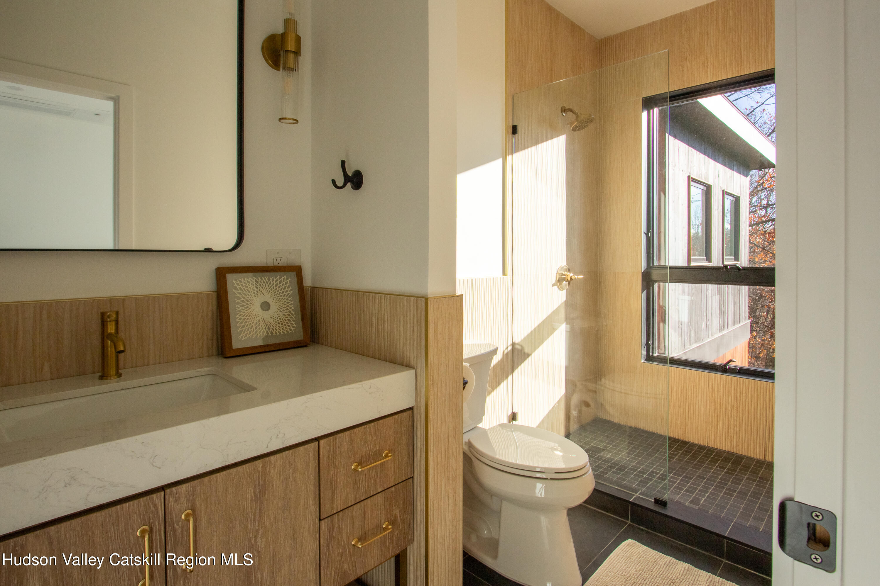 490 Old Rte 82 Elizaville, NY 12523 - Photo 15 of 26 a bathroom with a sink a toilet and a mirror