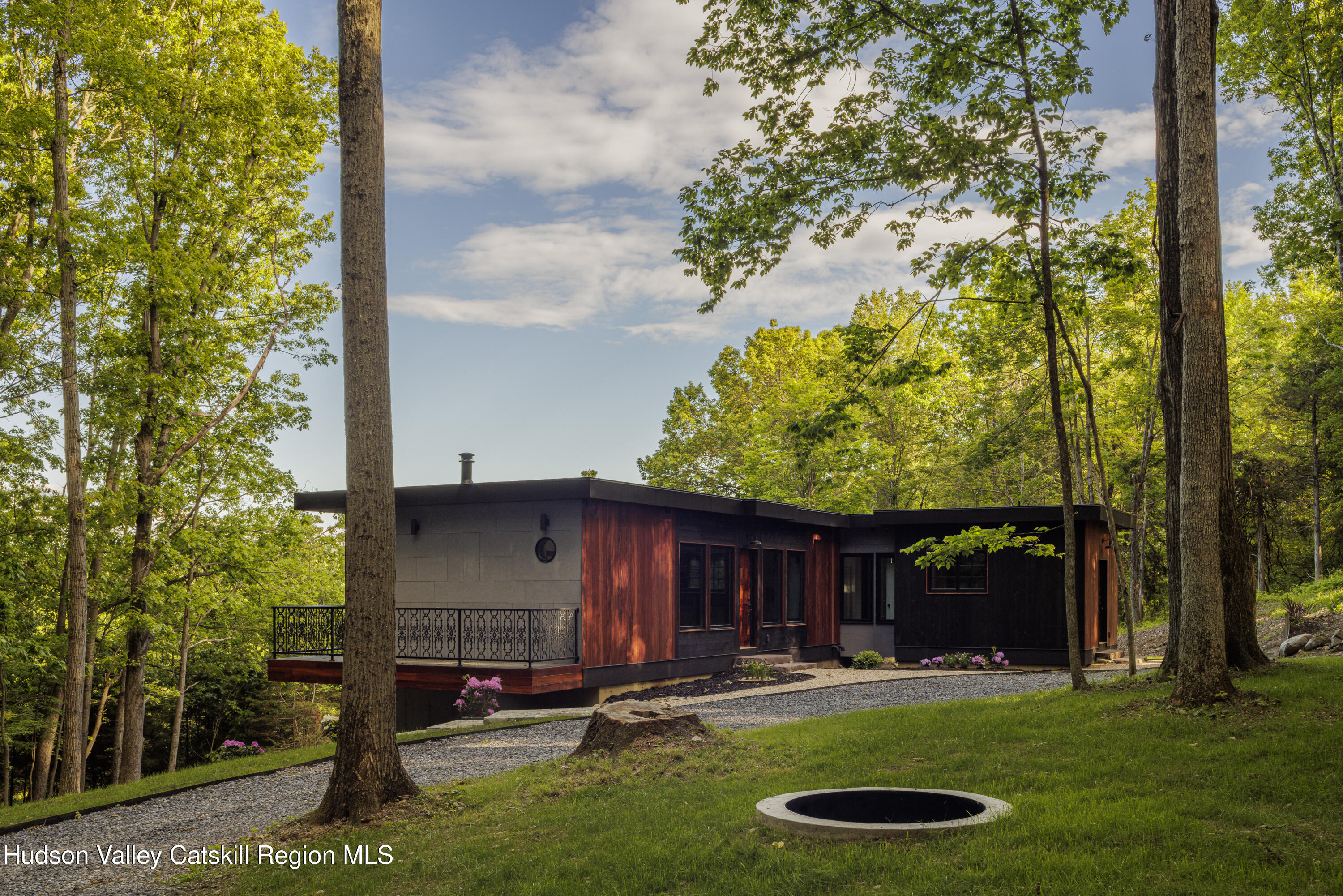 490 Old Rte 82 Elizaville, NY 12523 - Photo 20 of 26 a backyard of a house with barbeque oven and seating space