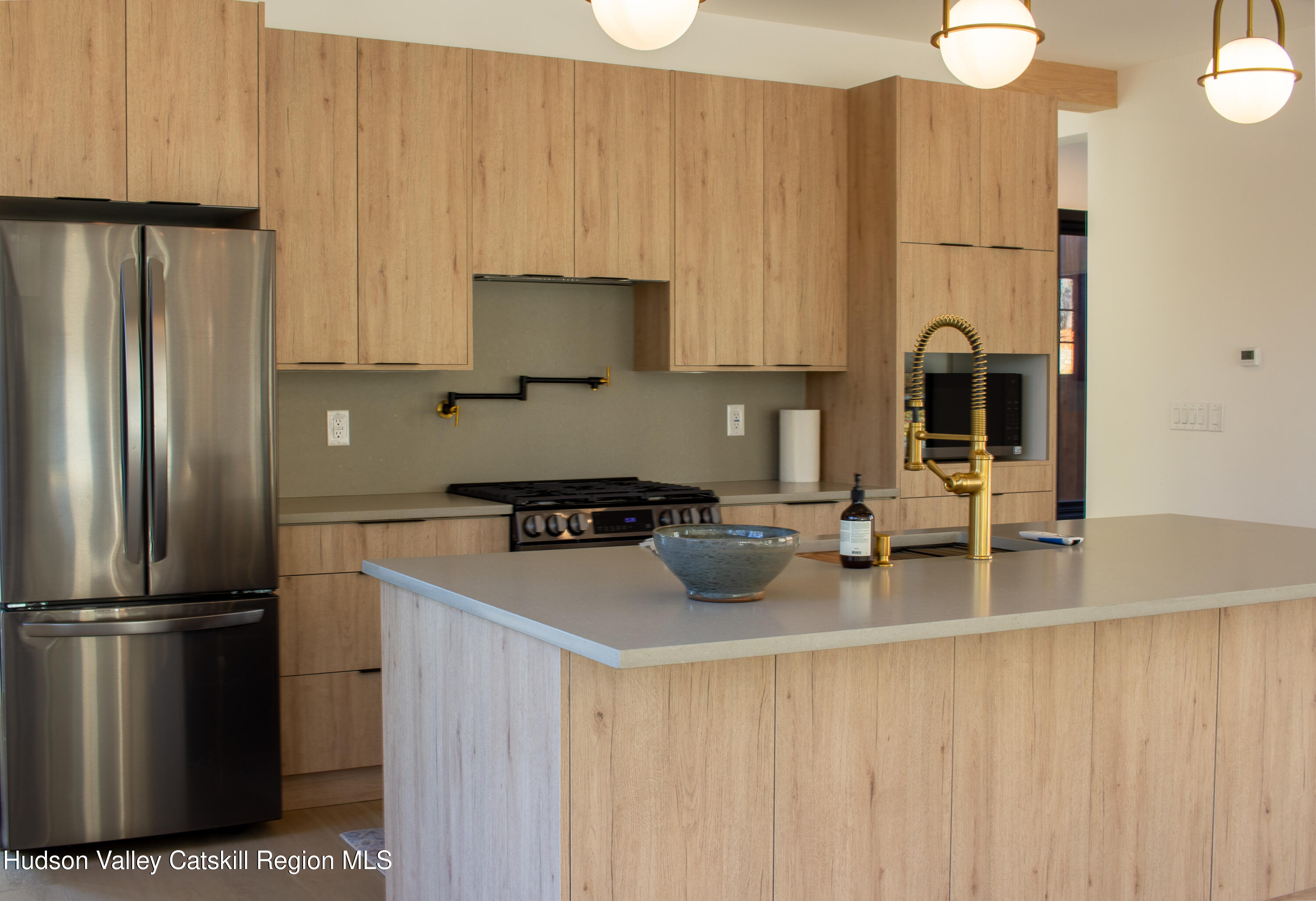 490 Old Rte 82 Elizaville, NY 12523 - Photo 9 of 26 a kitchen with stainless steel appliances a refrigerator sink and stove