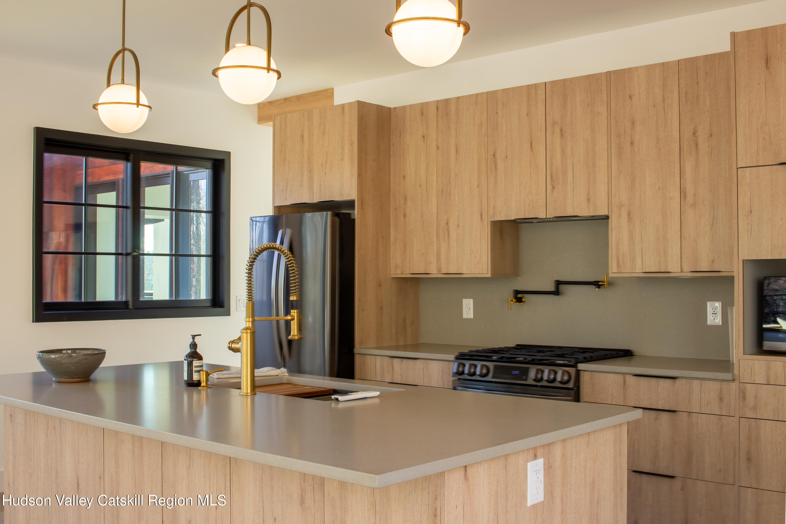 490 Old Rte 82 Elizaville, NY 12523 - Photo 10 of 26 a kitchen with stainless steel appliances granite countertop a sink a stove and a refrigerator