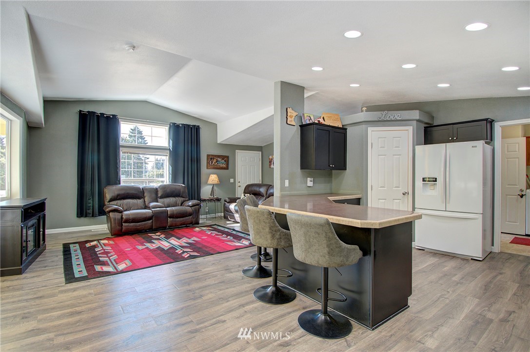 595 Nevil Road Winlock, WA 98596 - Photo 11 of 34 a living room with furniture and wooden floor