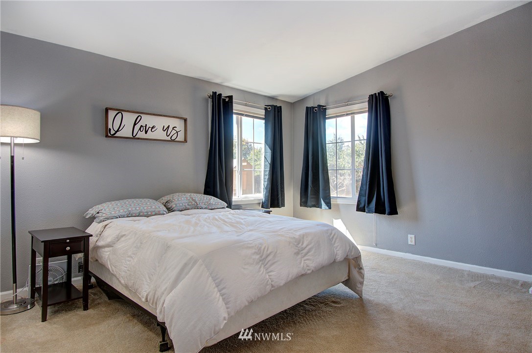595 Nevil Road Winlock, WA 98596 - Photo 18 of 34 a bedroom with a bed and a window