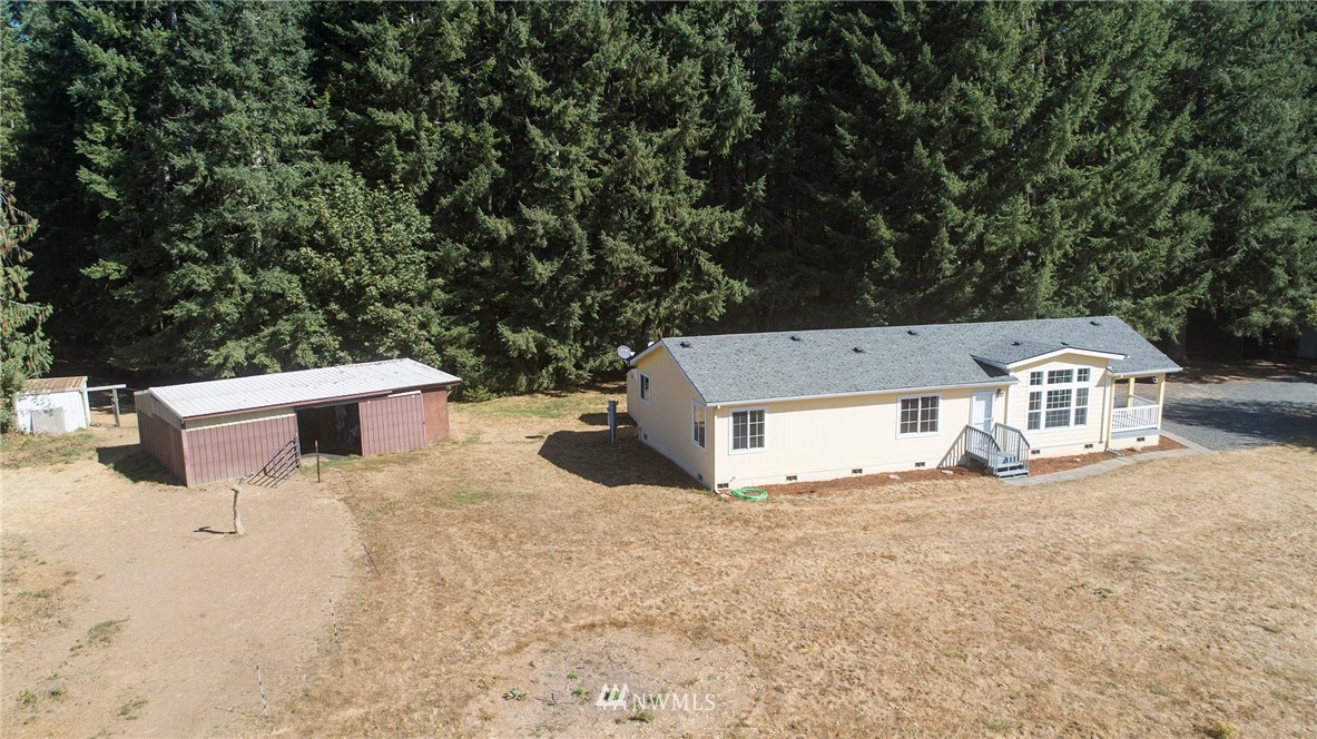595 Nevil Road Winlock, WA 98596 - Photo 34 of 34 a view of a house with a yard