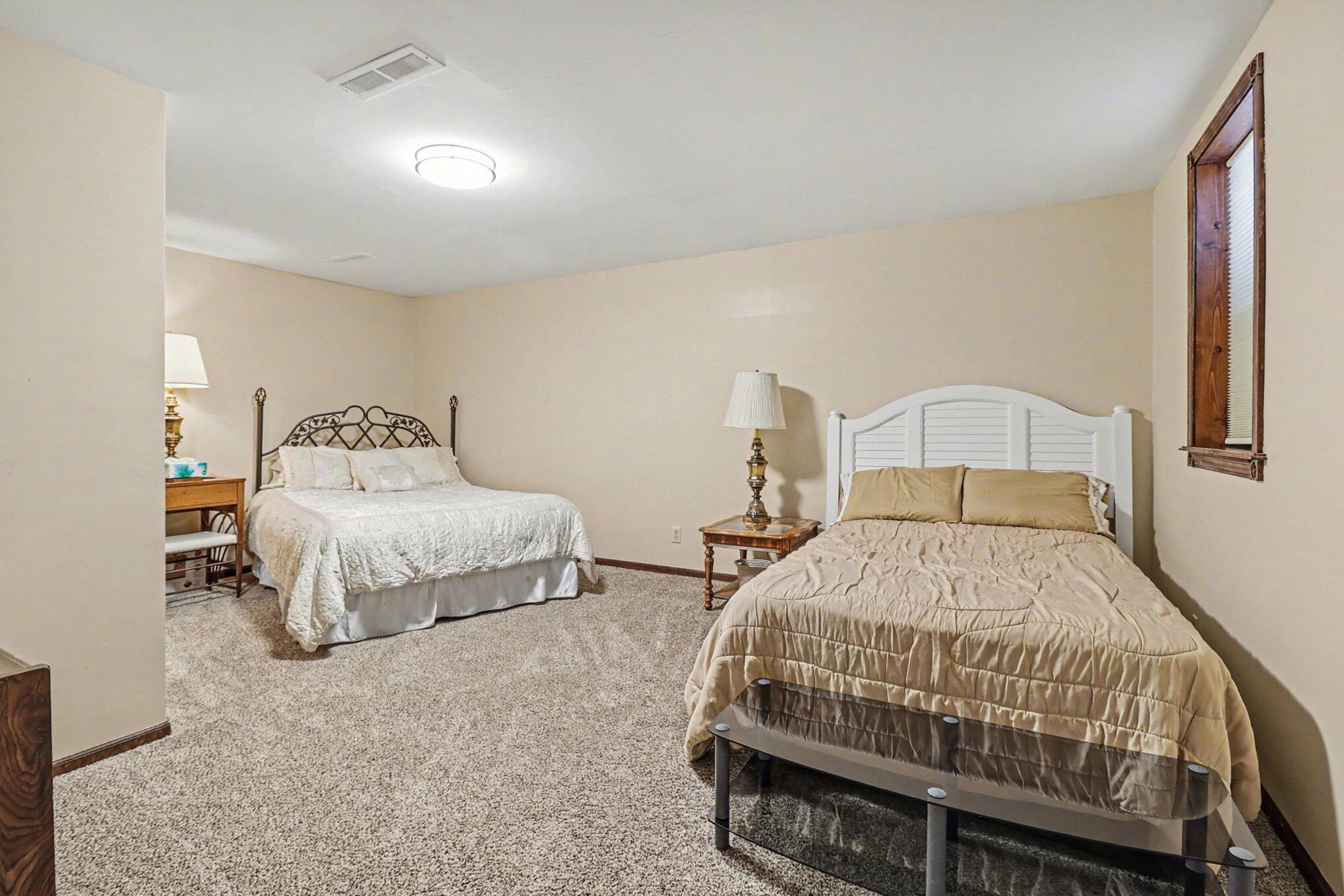 9629 North Kings Point Irons, MI 49644 - Photo 20 of 39 Basement Bedroom