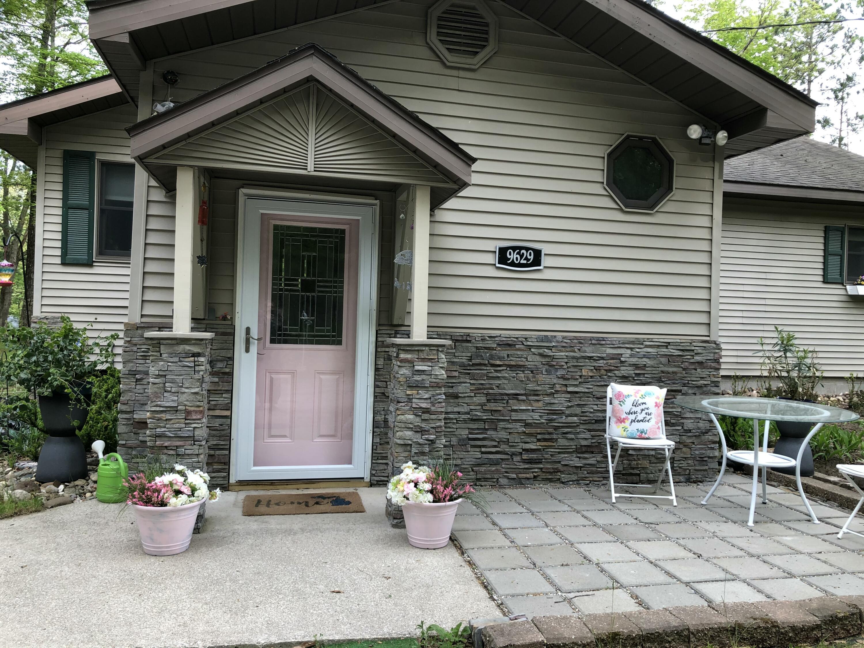 9629 North Kings Point Irons, MI 49644 - Photo 30 of 39 Lush & Bright Entrance
