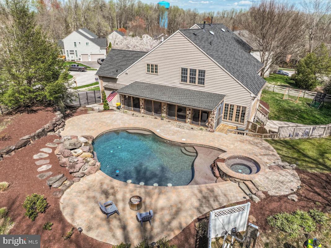 3421 Swallowtail Court Edgewater, MD 21037 - Photo 2 of 79 Backyard with fabulous Pool/Spa and 2 Waterfalls