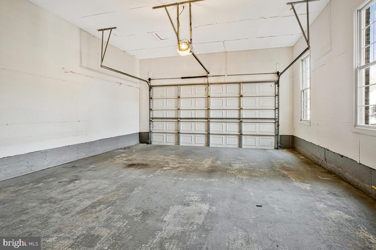 3421 Swallowtail Court Edgewater, MD 21037 - Photo 30 of 79 Over-sized 2 car garage w large storage/work bench