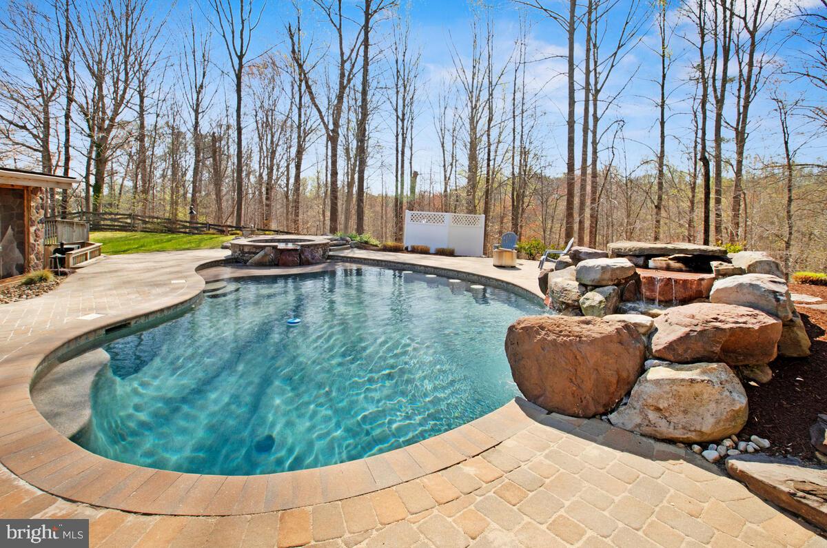 3421 Swallowtail Court Edgewater, MD 21037 - Photo 64 of 79 Pool with 2 Waterfall