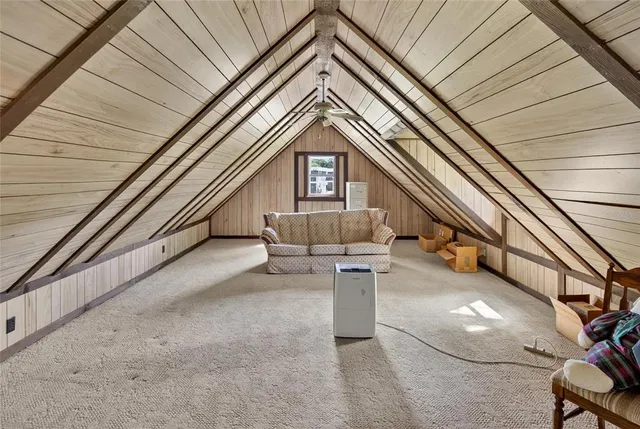 a bed room with furniture and wooden floor