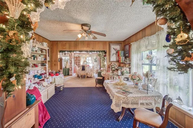 walk in closet with lots of books