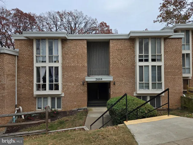 a front view of a house with yard