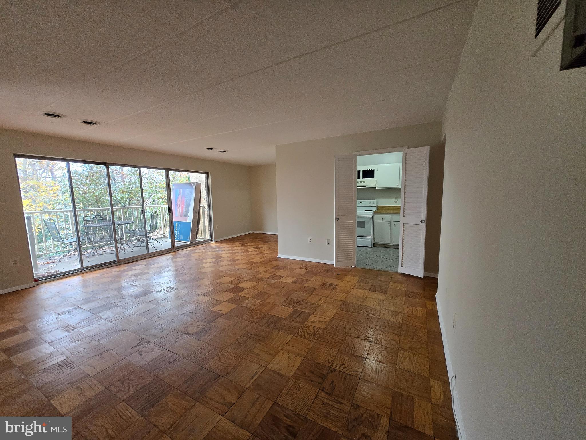 2614 Fort Farnsworth Road, Unit 254 Alexandria, VA 22303 - Photo 4 of 11 a view of an empty room and a window