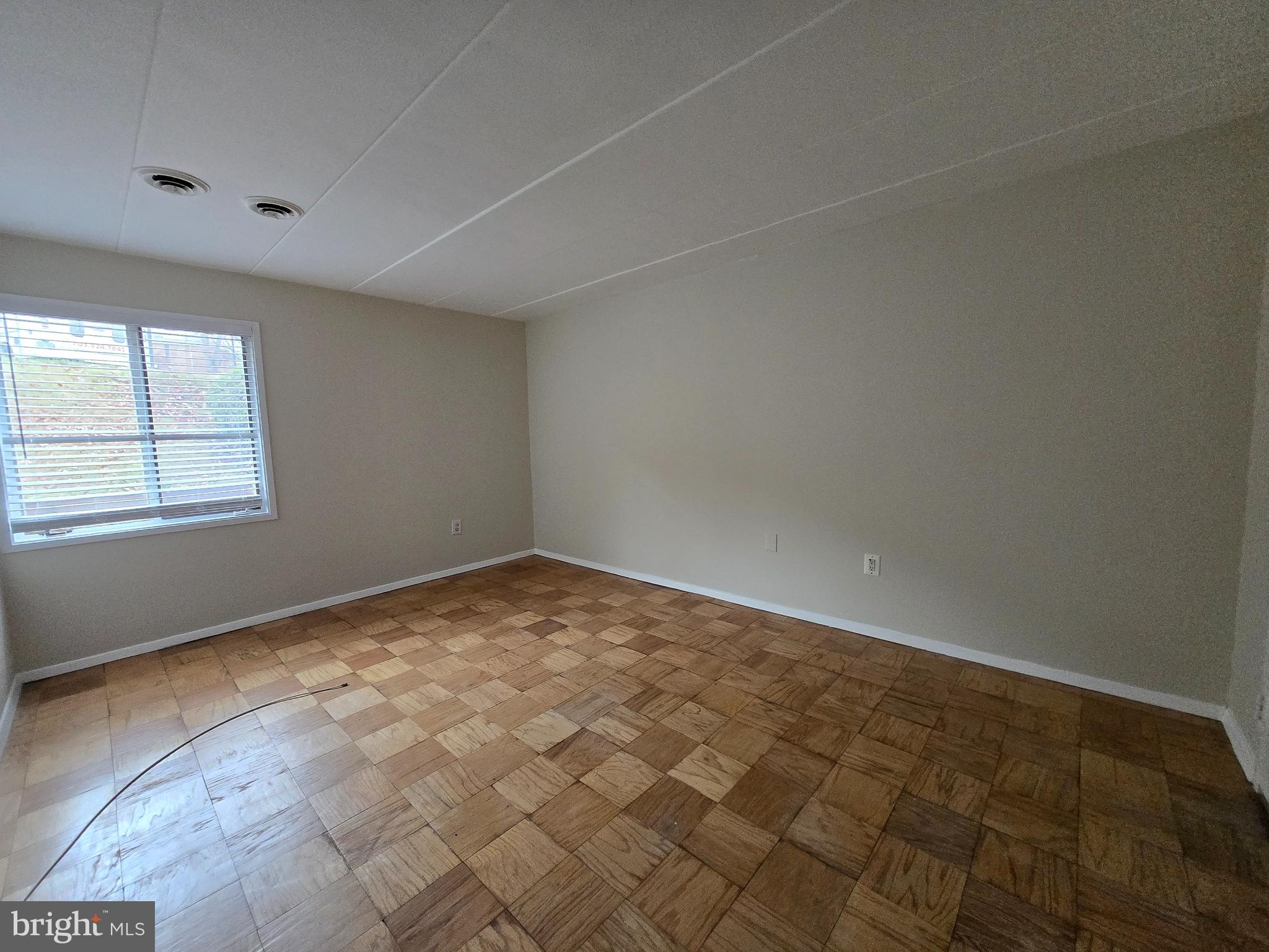 2614 Fort Farnsworth Road, Unit 254 Alexandria, VA 22303 - Photo 7 of 11 an empty room with windows