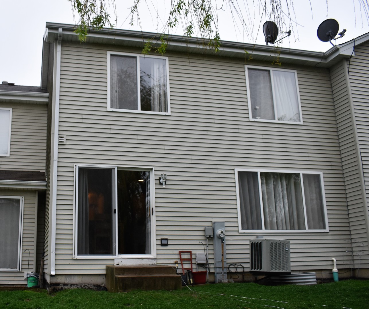 605 Chestnut Ridge Minooka, IL 60447 - Photo 15 of 16 a view of a house with a yard and large window