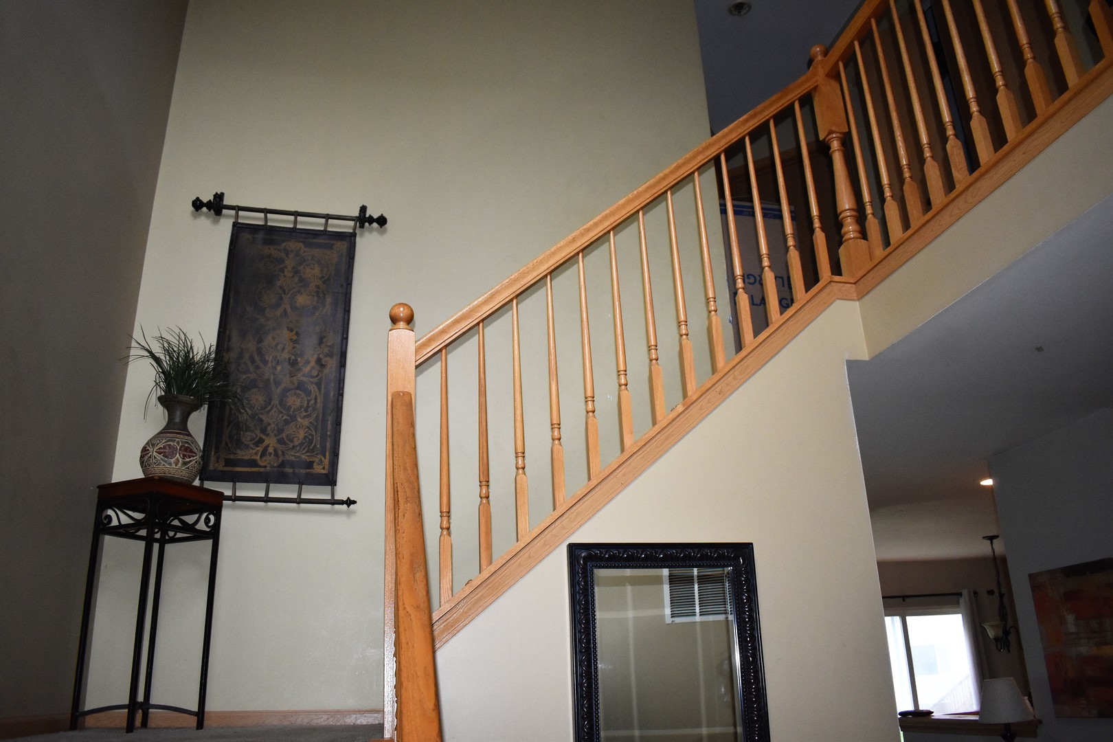 605 Chestnut Ridge Minooka, IL 60447 - Photo 2 of 16 a view of staircase with white walls and a window
