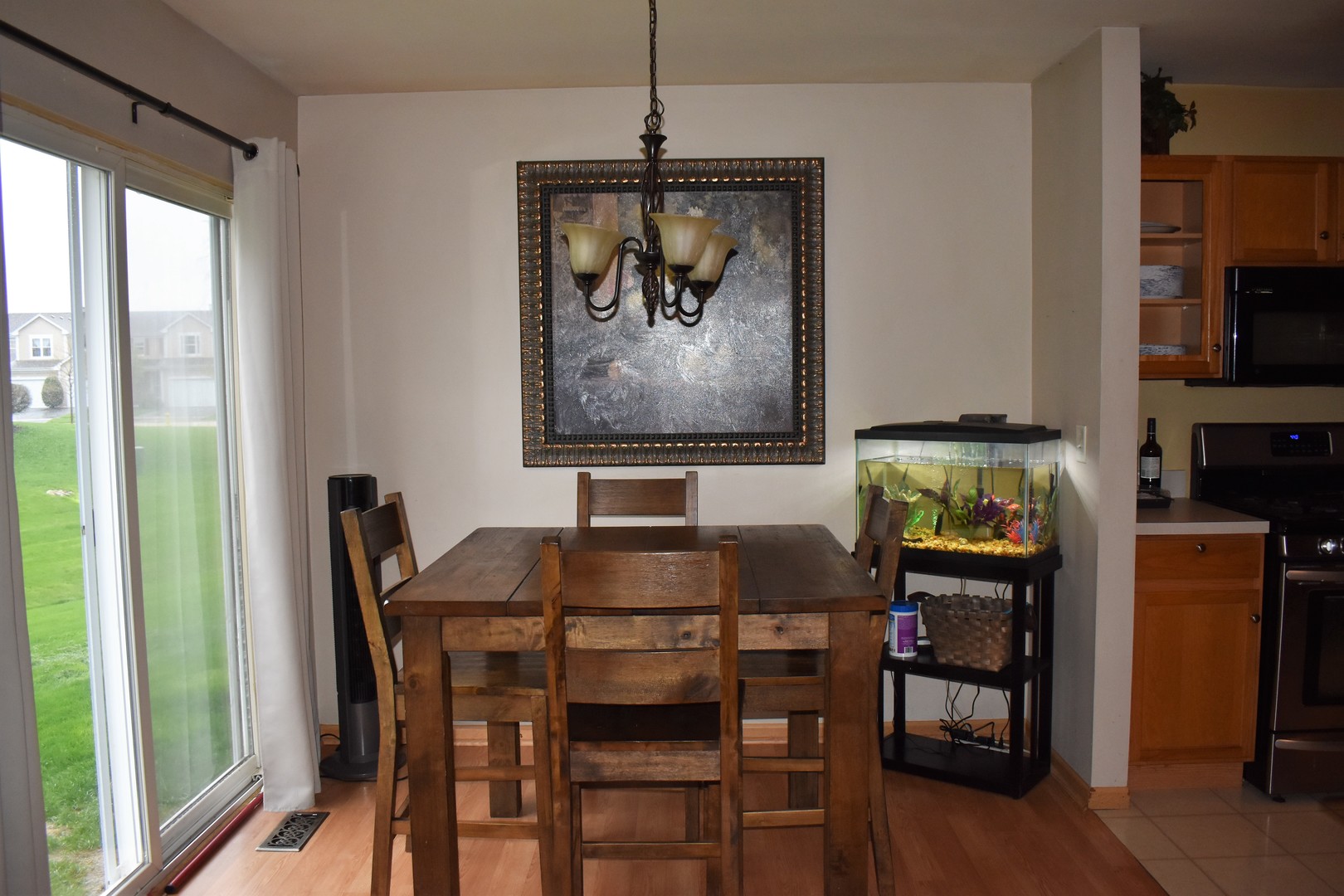 605 Chestnut Ridge Minooka, IL 60447 - Photo 5 of 16 a dining room with furniture and window