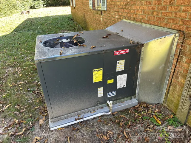 a front view of a house with parking area