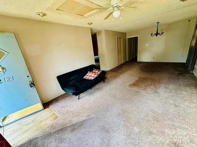 a view of room with window and stairs
