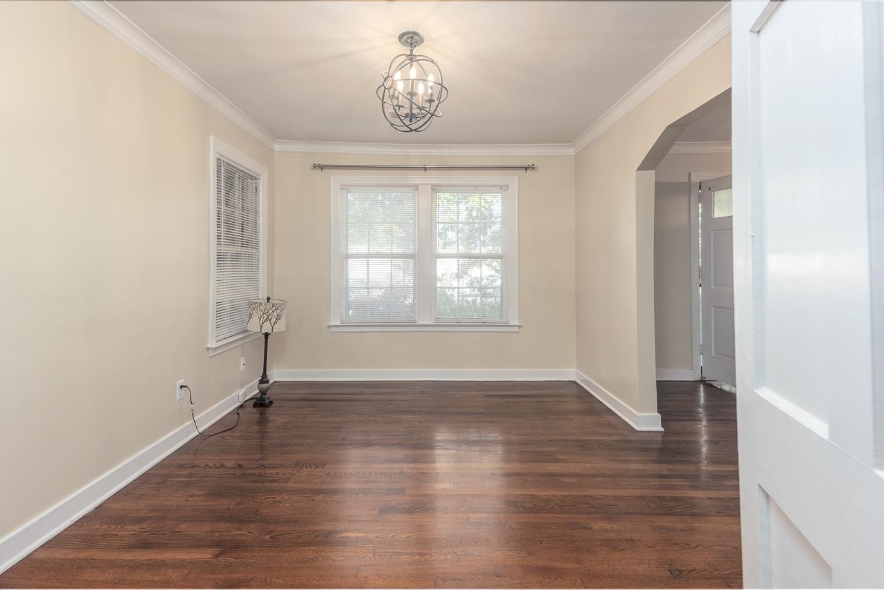 1264 Dovecrest Road Memphis, TN 38134 - Photo 15 of 30 wooden floor in an empty room with a window