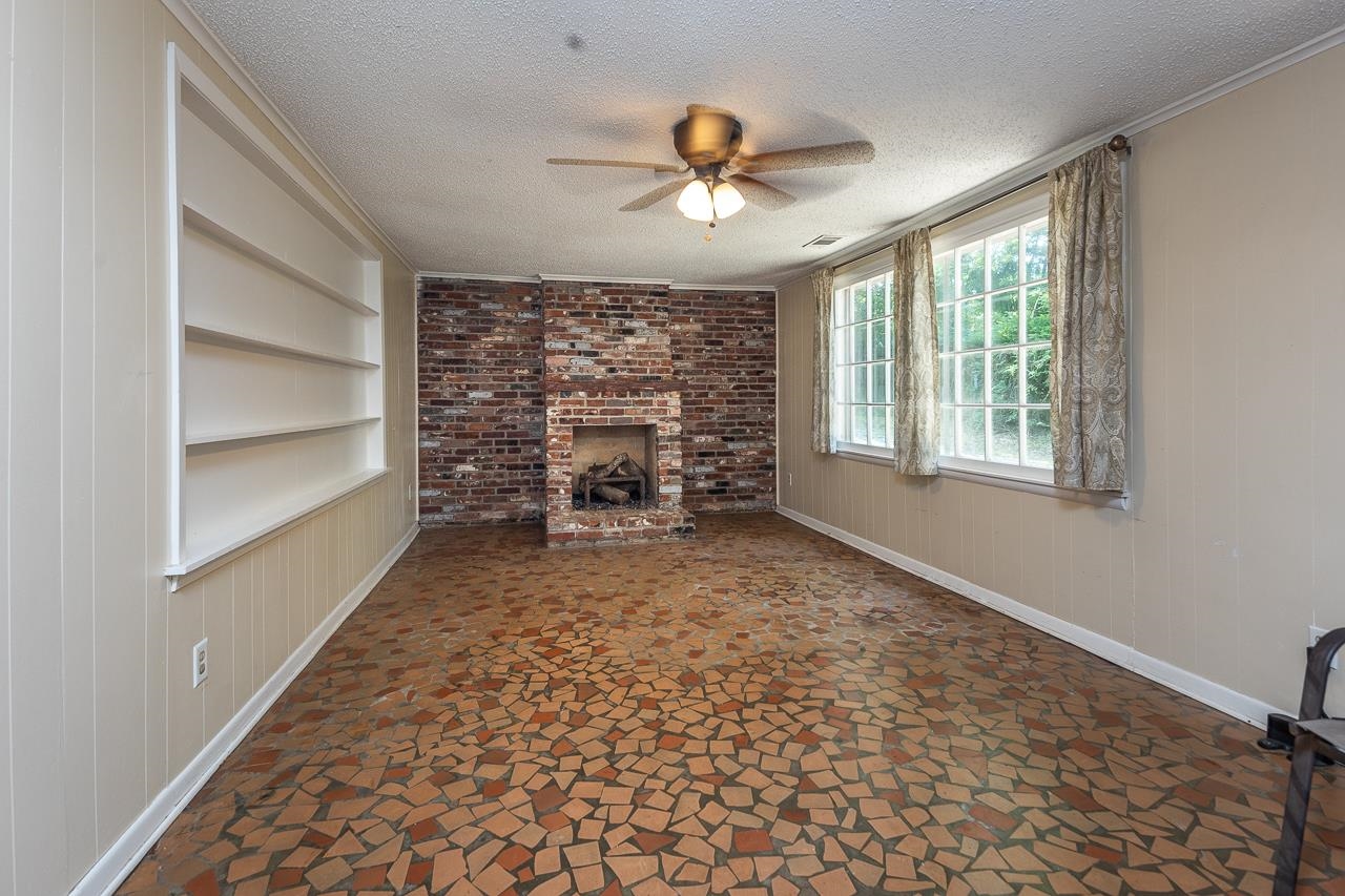 1264 Dovecrest Road Memphis, TN 38134 - Photo 19 of 30 a view of a livingroom with a staircase