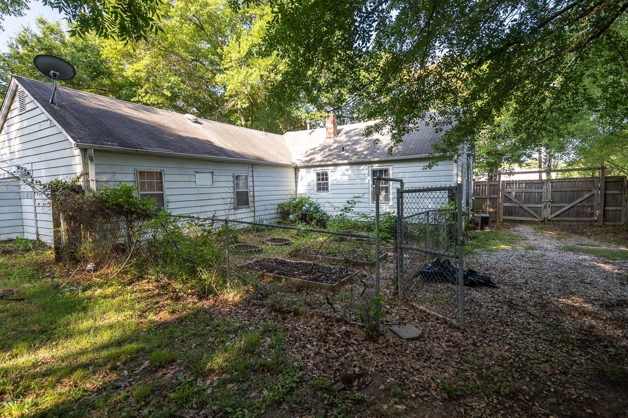 1264 Dovecrest Road Memphis, TN 38134 - Photo 23 of 30 a view of a house with a yard