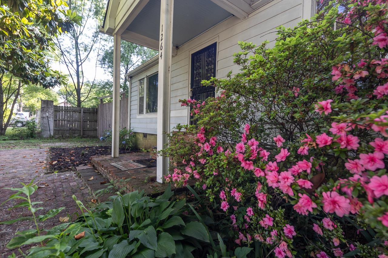 1264 Dovecrest Road Memphis, TN 38134 - Photo 4 of 30 a view of a house with flower garden
