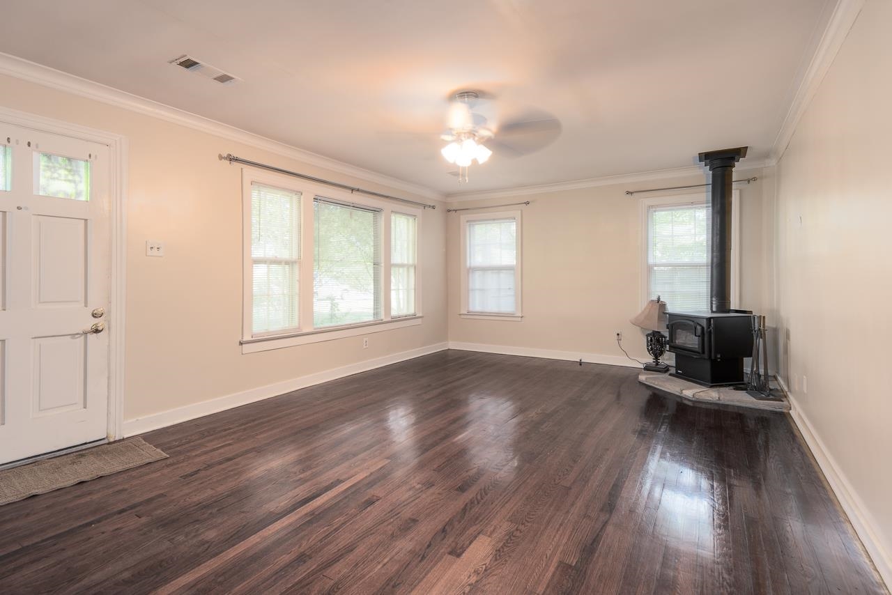 1264 Dovecrest Road Memphis, TN 38134 - Photo 8 of 30 a view of workspace with wooden floor and windows