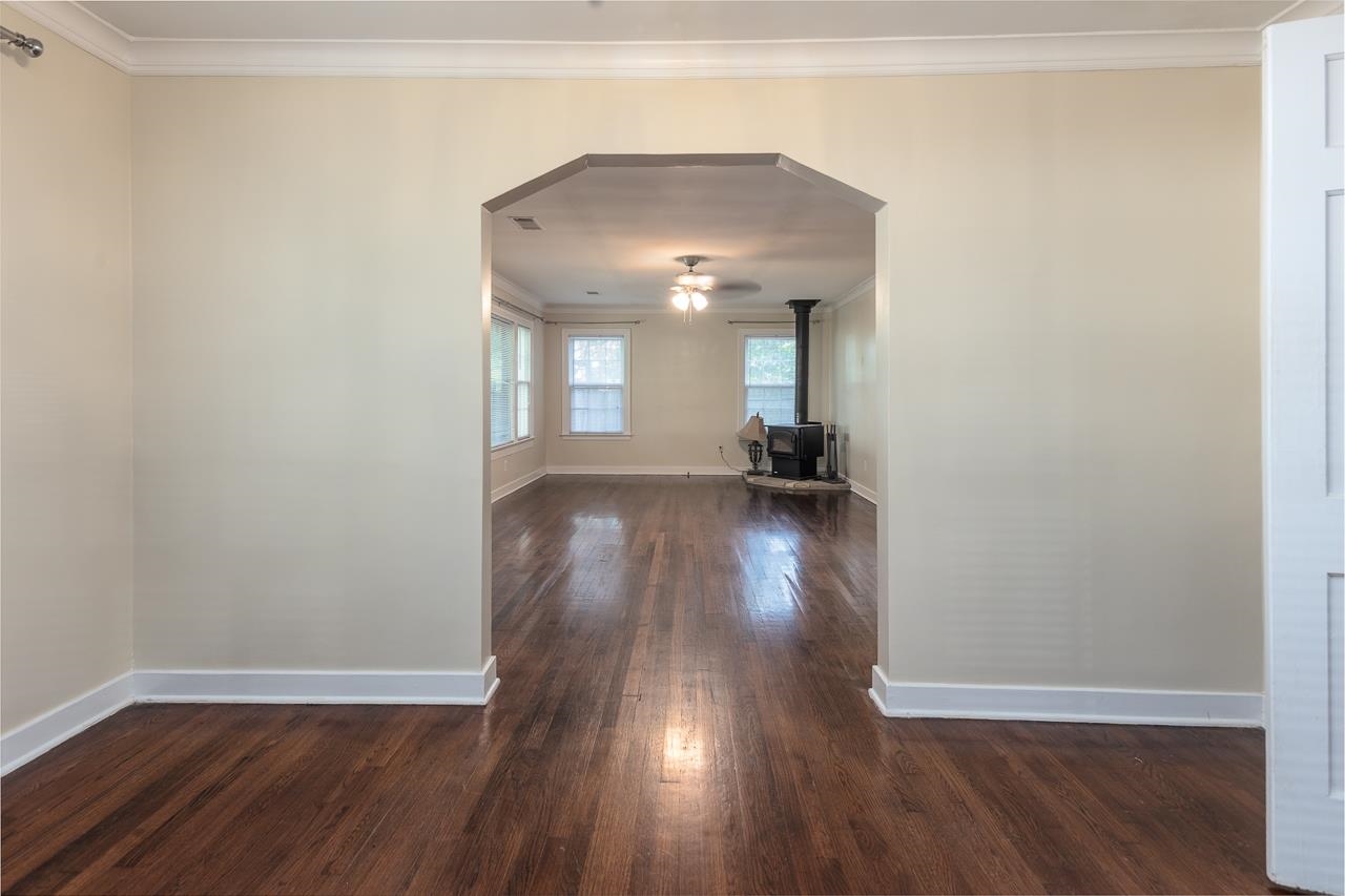 1264 Dovecrest Road Memphis, TN 38134 - Photo 10 of 30 a view of empty room with wooden floor