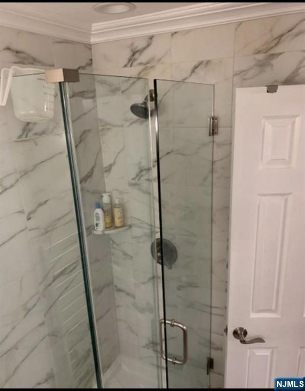 26 Sampson Street, Unit 1 Garfield, NJ 07026 - Photo 9 of 12 a bathroom with a shower