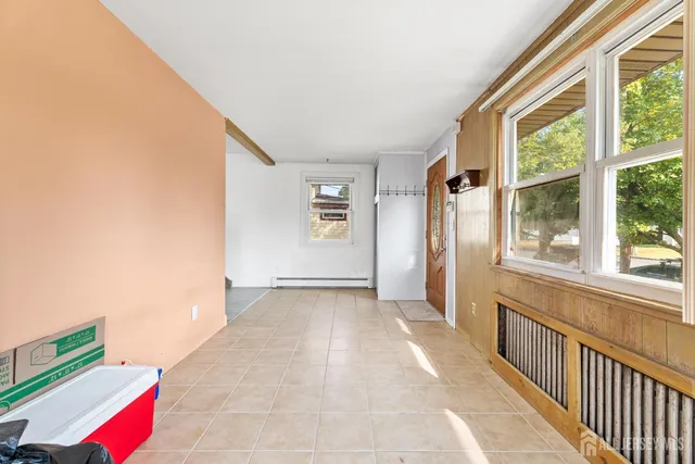 a view of hallway with windows