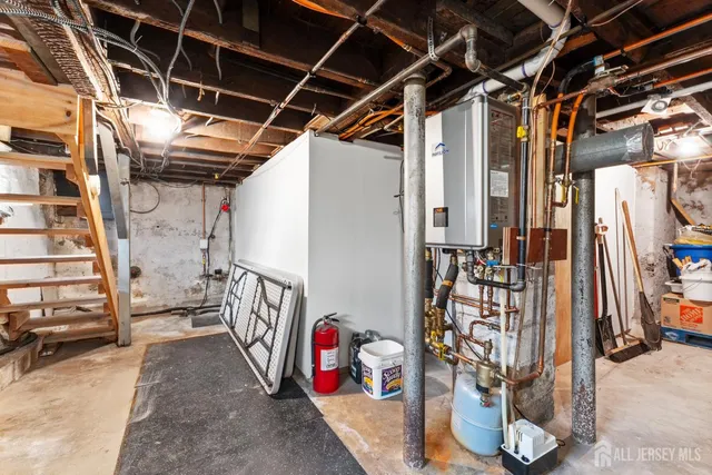 a view of entryway with wooden stairs