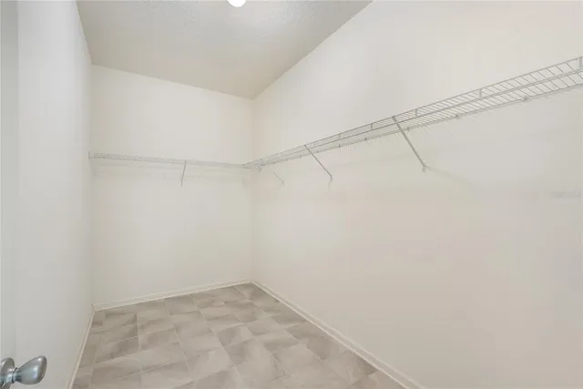 a view of a room with racks on the wall