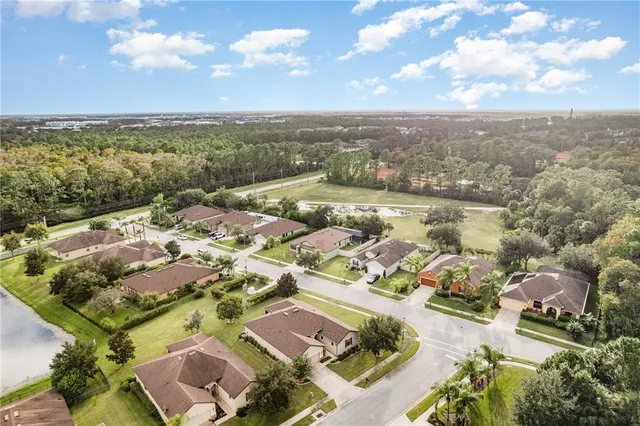 an aerial view of residential building with outdoor space