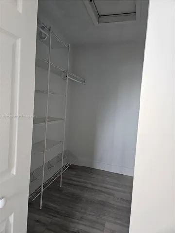 a view of an empty walk in closet