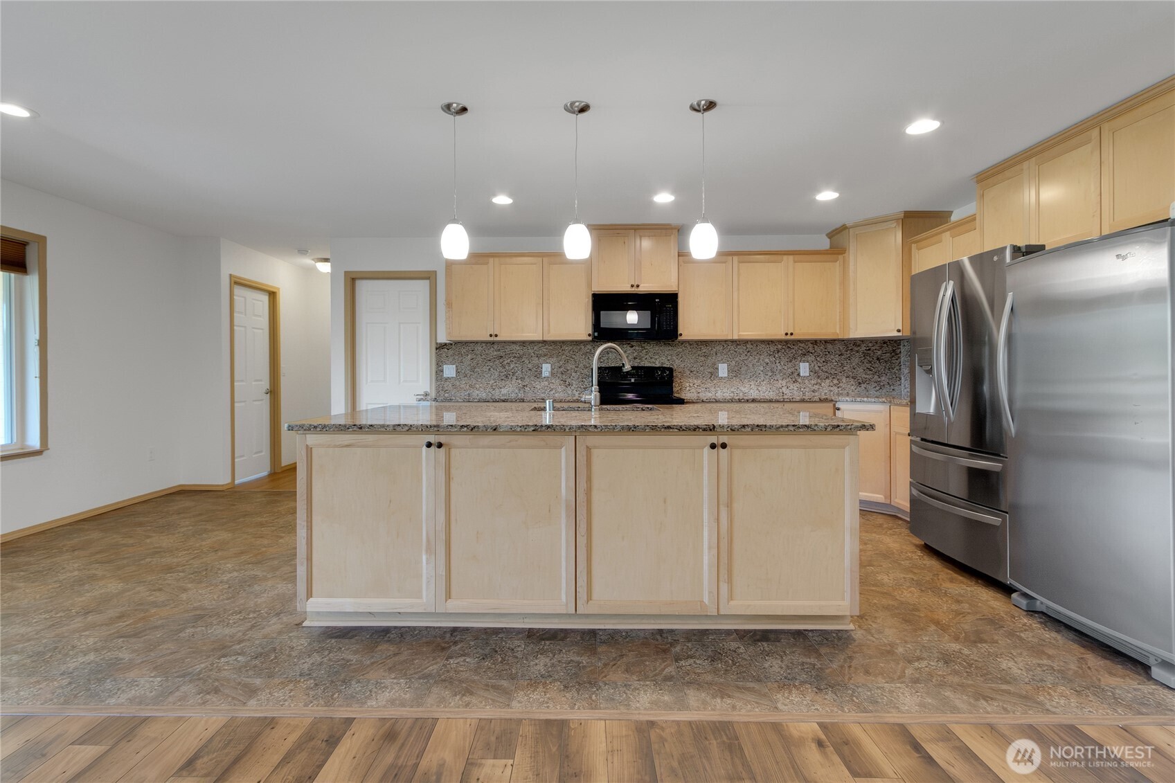 1450 Southeast Spruce Road Port Orchard, WA 98367 - Photo 9 of 39 a large kitchen with cabinets