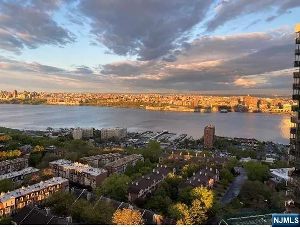 a view of a balcony with city view