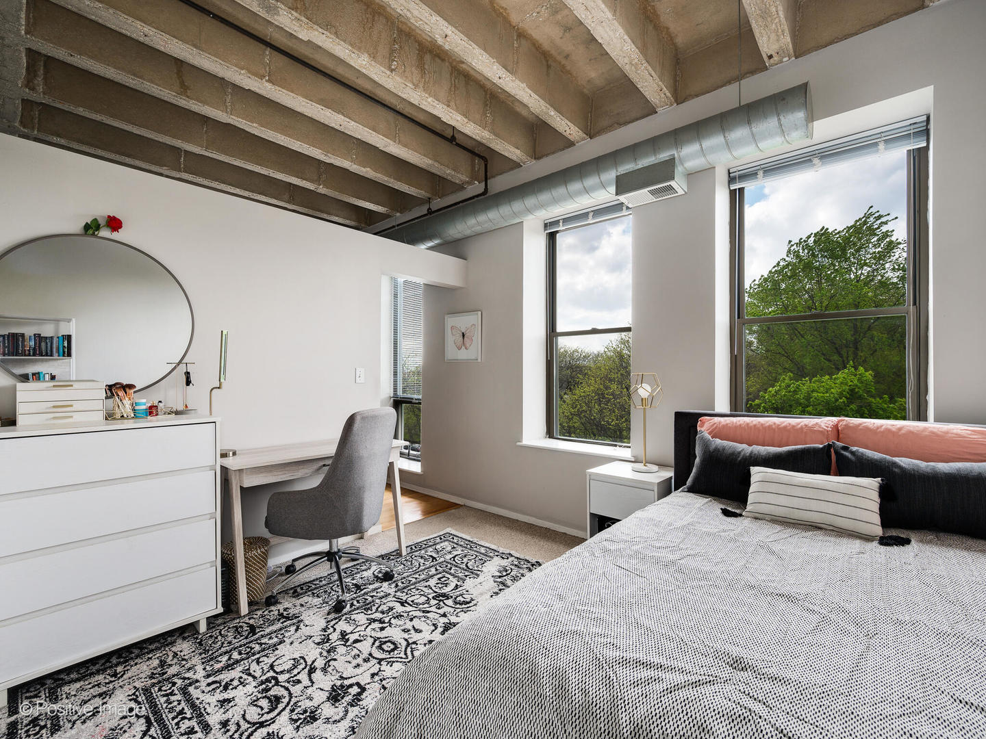 811 South Lytle Street, Unit 303 Chicago, IL 60607 - Photo 15 of 17 a bedroom with a bed chair and window