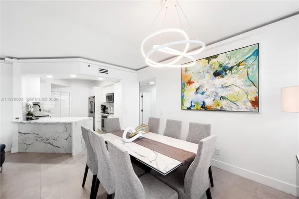 a kitchen with a sink stove top oven and cabinets