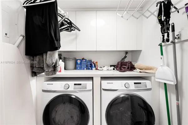 a view of a water fountain in front of a house