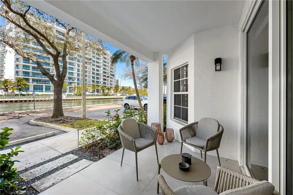 a view of swimming pool with outdoor space and seating area